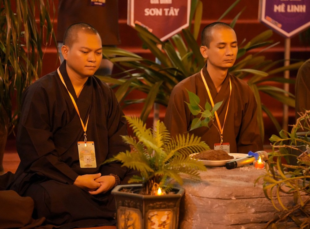 A group of men sitting in front of a plant

AI-generated content may be incorrect.