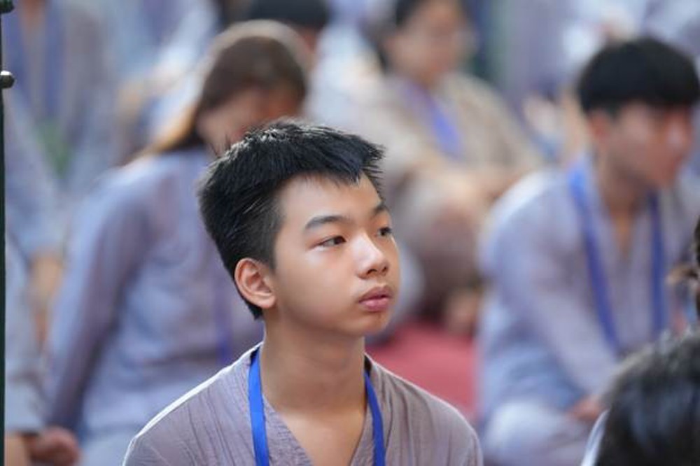 A young child wearing a lanyard

AI-generated content may be incorrect.