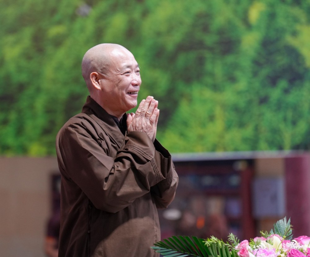 A person in brown robe with hands together

AI-generated content may be incorrect.