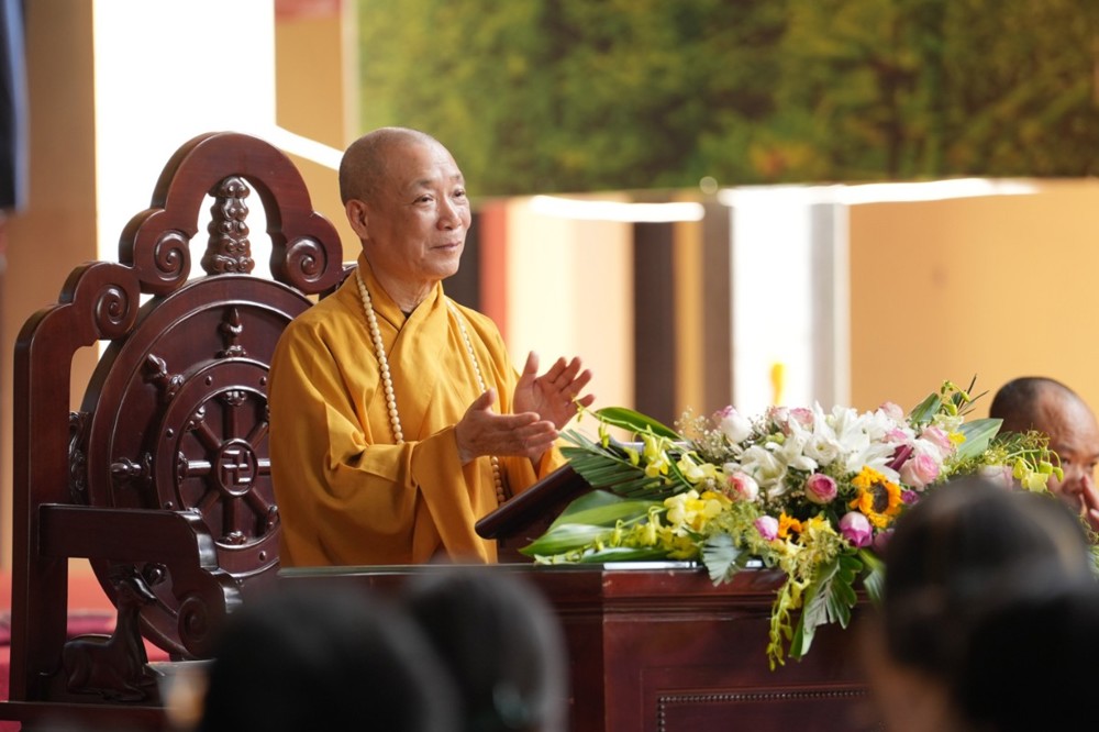 A person in a yellow robe standing at a podium

AI-generated content may be incorrect.