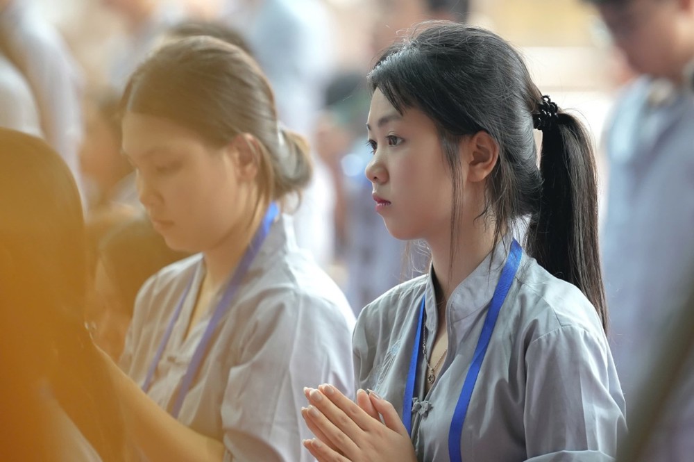 A group of women praying

AI-generated content may be incorrect.