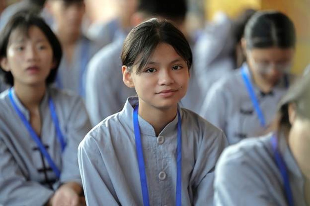 A young child wearing lanyards

AI-generated content may be incorrect.
